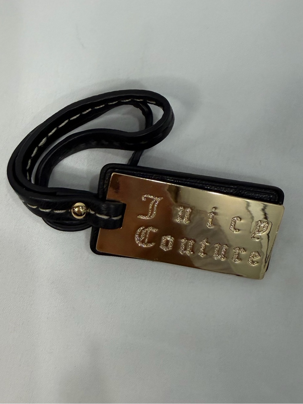Juicy Couture luggage tag with gold plate